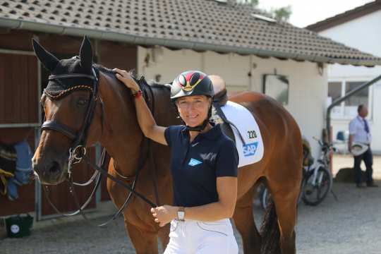 Ingrid Klimke in the stables area of the CHIO Aachen.