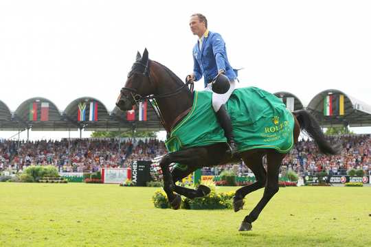 Christian Ahlmann and Codex One, winner of the Rolex Grand Prix 2014. Foto: CHIO Aachen/A. Steindl