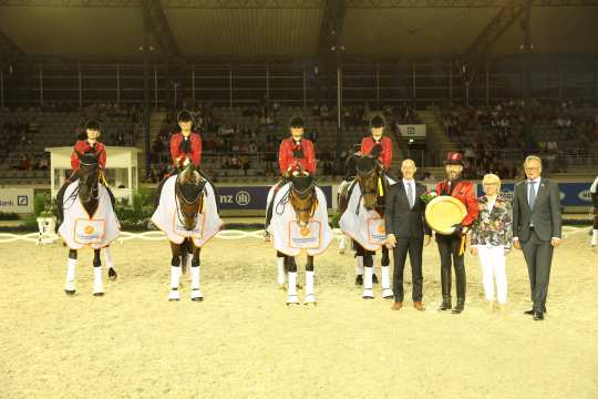 Marco Herwartz, (left), Caroline Fister-Hartmann and Frank Kemperman (right) congratulate the team.