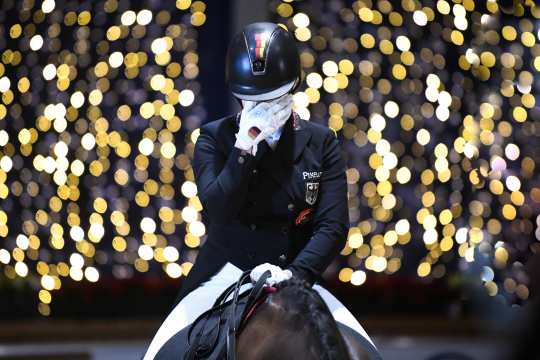 1st place: Mirka Nilkens. Her photo shows an extraordinary moment during an award ceremony at the Aachen Dressage Youngstars 2021.
