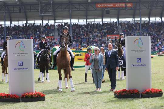 Winner 2023: Frederic Wandres (GER) - presentation of the prize by Mrs. Anja Heeb-Lonkwitz (Managing Director of the Liselott Schindling Foundation for the Promotion of Dressage Riding) accompanied by Mr. Jürgen Petershagen (Member of the Supervisory Board ALRV)