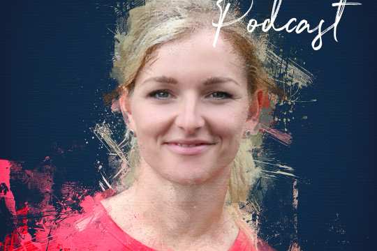 CHIO Aachen podcast cover with Julia Krajewski in a painterly style with pink and beige brushstrokes on the contours of her smiling portrait. Julia is wearing a pink top and has tied back her blonde hair.